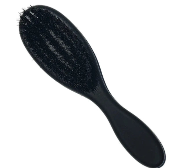 Close-up of the Barber Works Fade Cut Brush showing its soft, natural bristles in detail.
