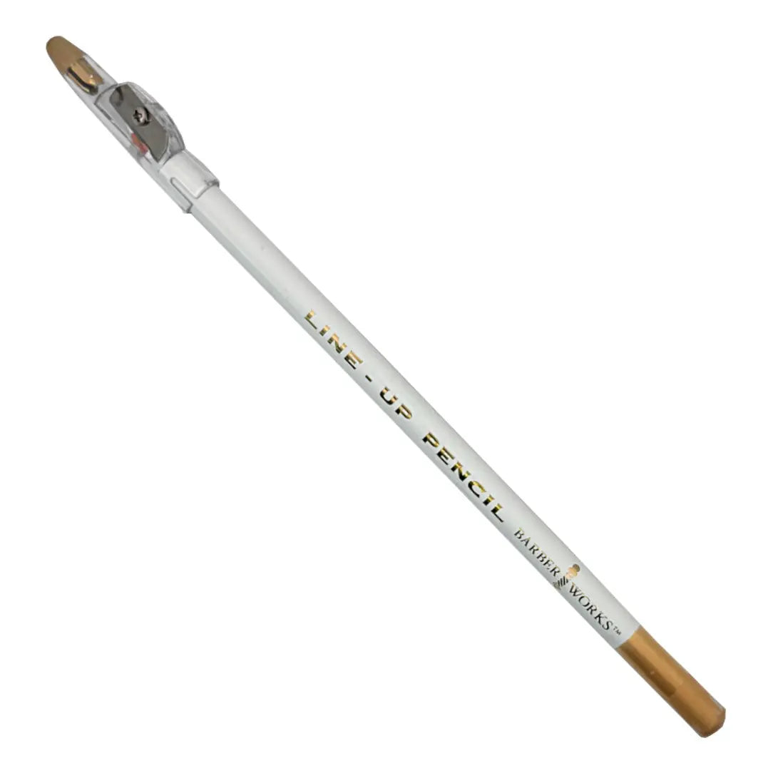 Barber Works White line-up pencil with gold cap and blade on a white background