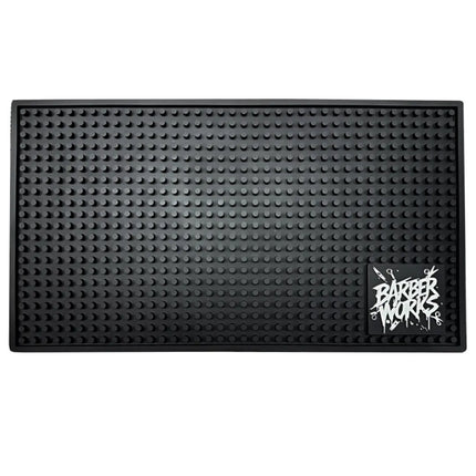 “Heat‑resistant Barber Works tool mat 17.5 × 10 inches on Las Vegas barbershop workstation”

