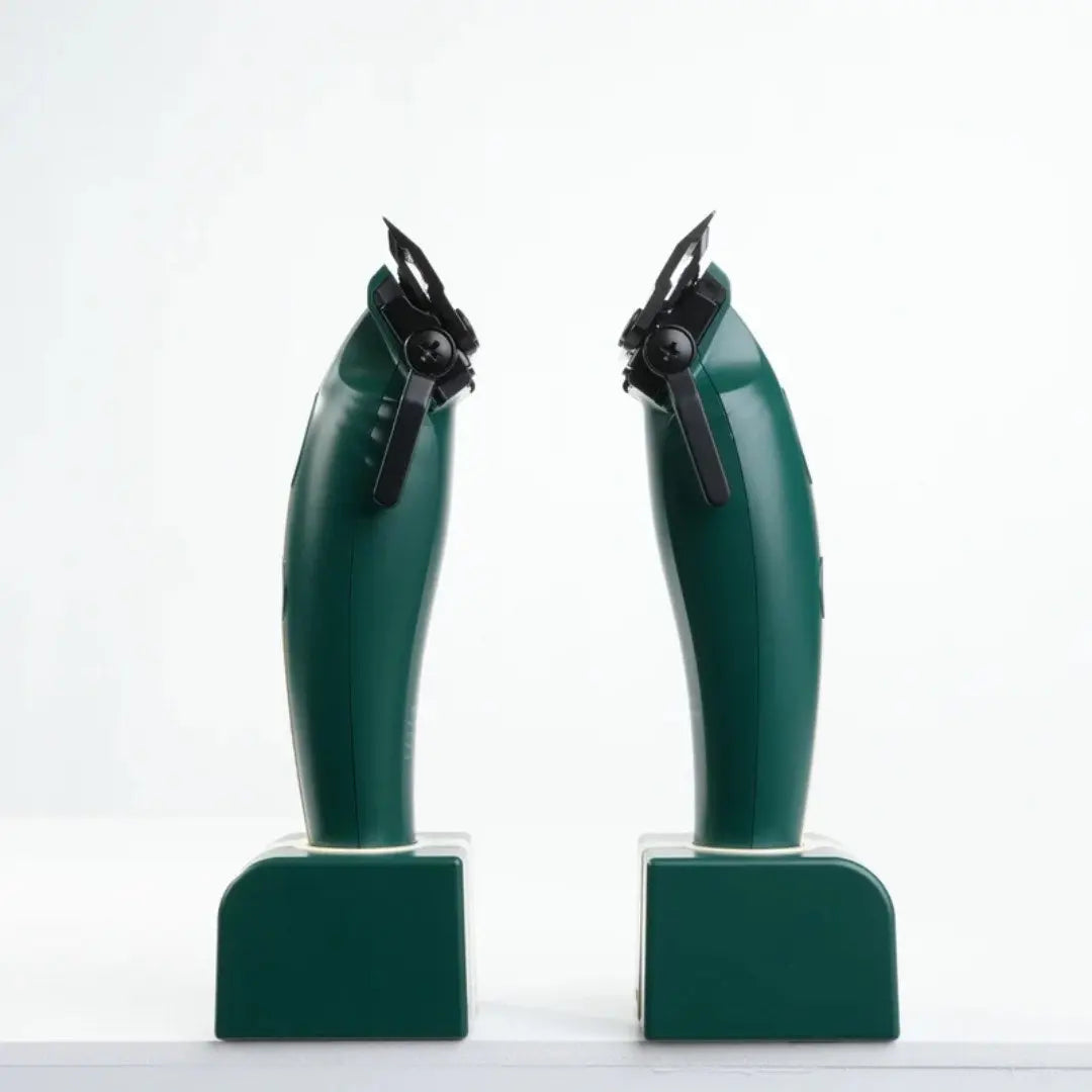 Two green mechanical devices on a white background