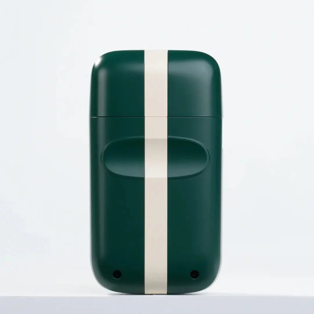 COCCO Veloce Lite Shaver (Green/White) Dual Foil on a light gray background