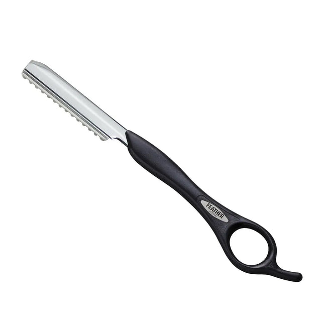 “Close-up of the guarded blade on the Feather Styling Razor ensuring safety and precision”
