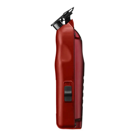 A red electric trimmer with a black clipper attachment and a black side switch, shown from a side profile view on a solid white background.