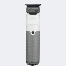 babyliss Hair trimmer with textured gray handle and white body on a light gray background