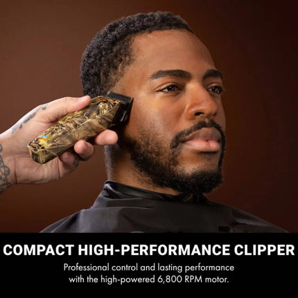 BaBylissPRO Camo LO-PROFX Compact Clipper (Limited Edition) Man using a compact high-performance clipper on his beard with a brown background