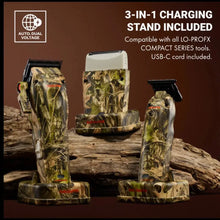 BaBylissPRO Camo LO-PROFX Compact Clipper (Limited Edition) Camouflage-styled grooming tools with a charging stand on a wooden surface.