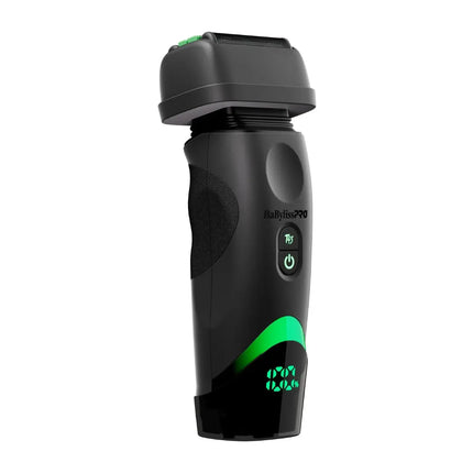 A black Babyliss PRO electric shaver with green illuminated accents and a digital battery percentage display, shown on a solid white background.