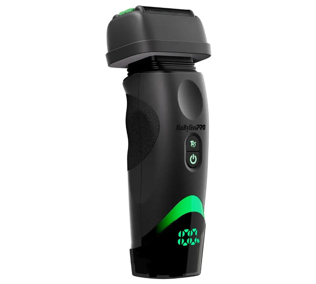 A black Babyliss PRO electric shaver with green illuminated accents and a digital battery percentage display, shown on a solid white background.
