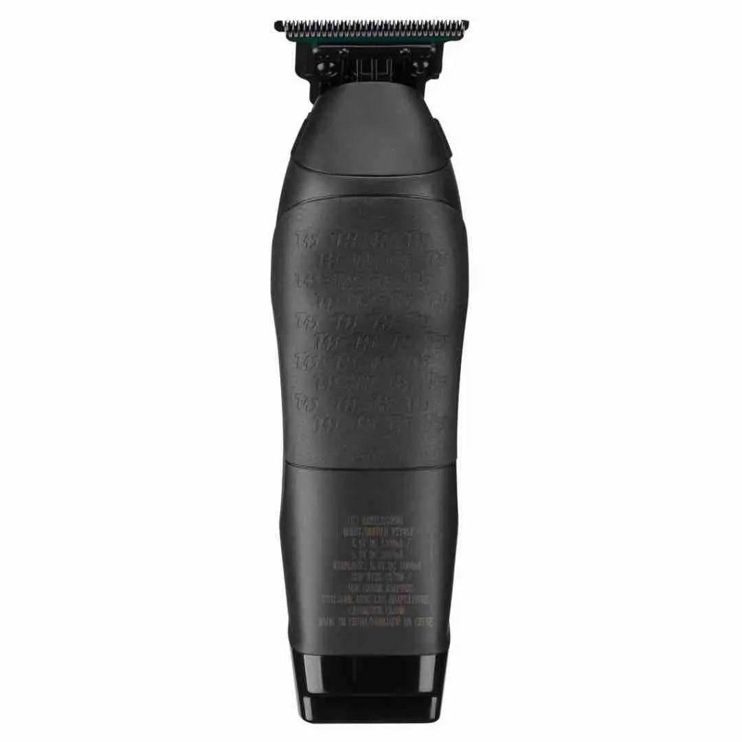 "Magnetic hair pocket door open on the BaBylissPRO x Tomb45 Trimmer for easy cleaning"
