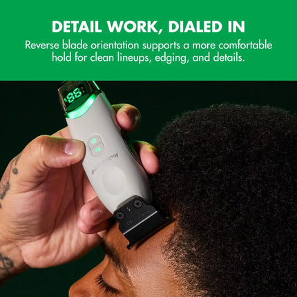 A close-up of a person using an BaBylissPRO Tomb45 White Wireless-Charging Trimmer – FXT45TTW on their head, with a green text banner at the top reading 'DETAIL WORK, DIALED IN' and additional descriptive copy about reverse blade orientation.