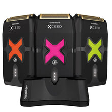 Three black shavers with colorful 'X' designs on a white background, featuring the brand 'gamma+ XCEED'.