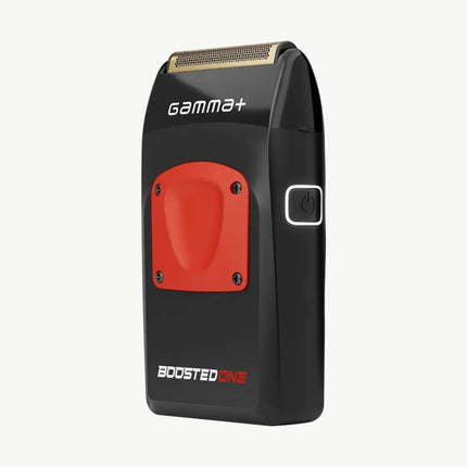 A black and red Gamma+ Boosted One electric shaver with a gold-toned metallic shaving head, shown on a light gray background.