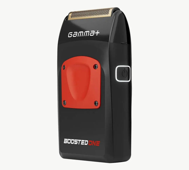 A black and red Gamma+ Boosted One electric shaver with a gold-toned metallic shaving head, shown on a light gray background.
