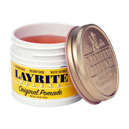 Open jar of Layrite Deluxe Original Pomade with gold lid on a white background