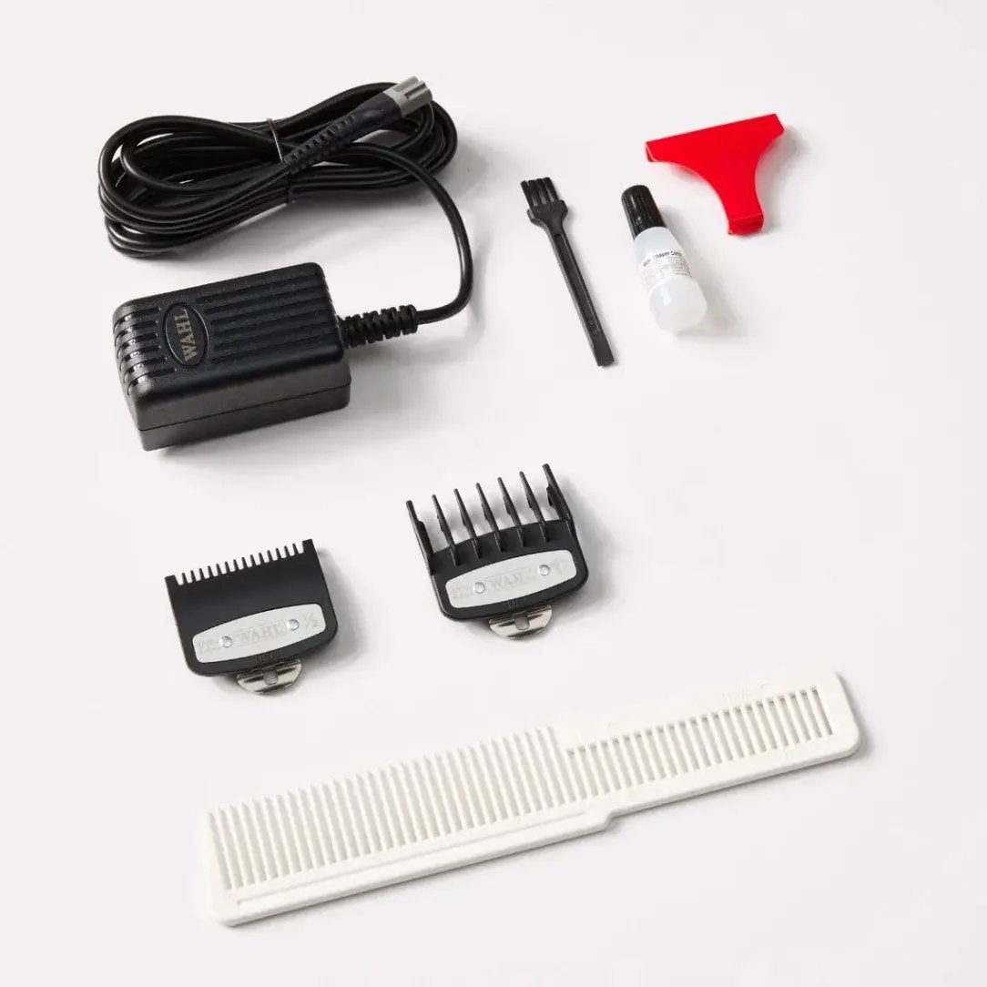 Hair trimmer set with attachments on a white background