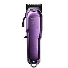 Purple Wahl hair clipper on a white background