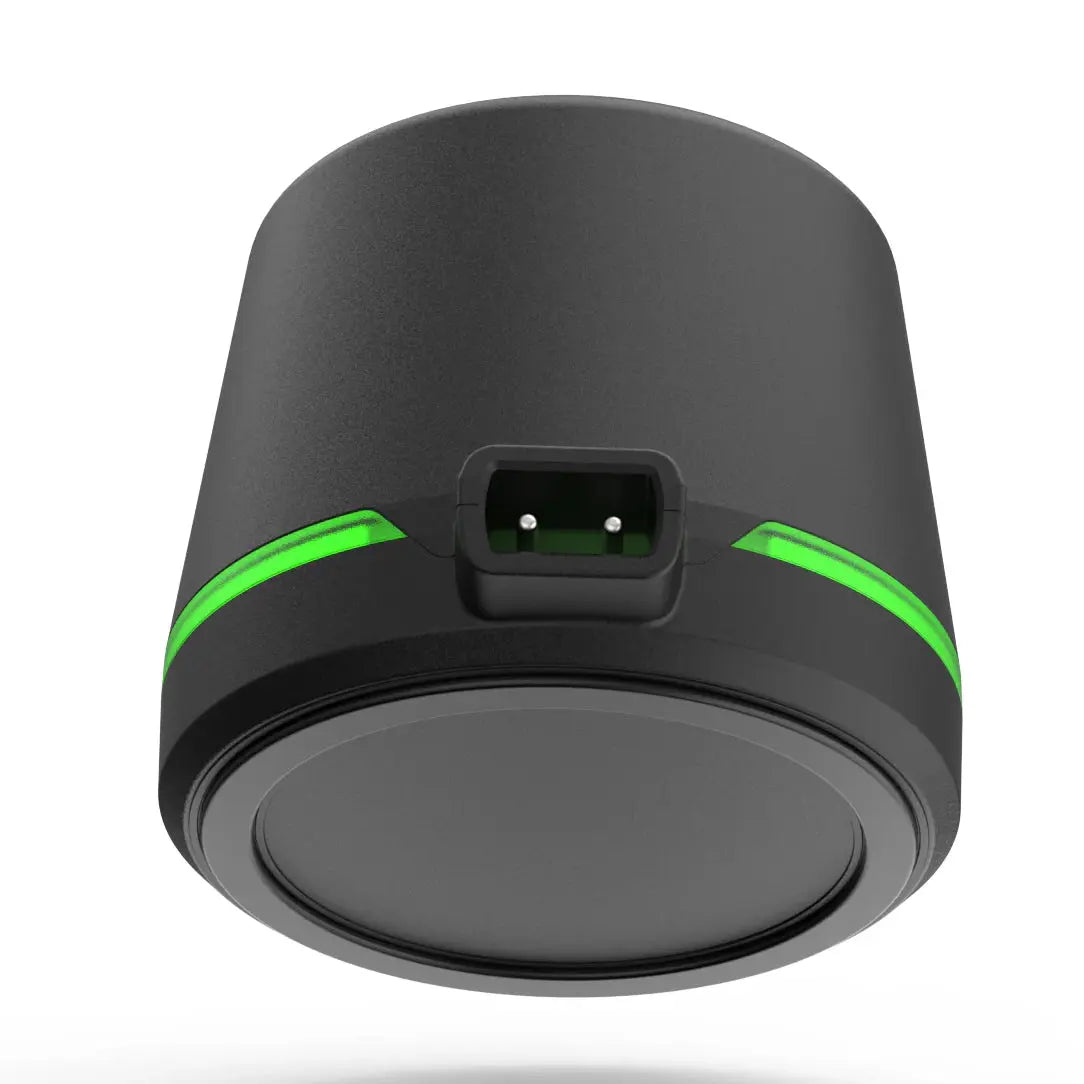 Monster Clippers Assassin Clipper Black cylindrical device with green accents on a white background