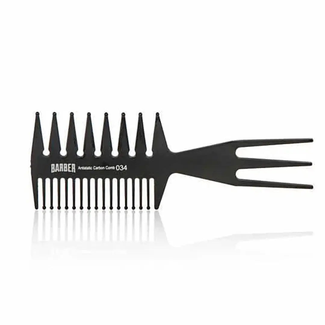 “Marmara BARBER Wide Tooth Comb Nº 034 held by a barber, showing its sturdy build”
