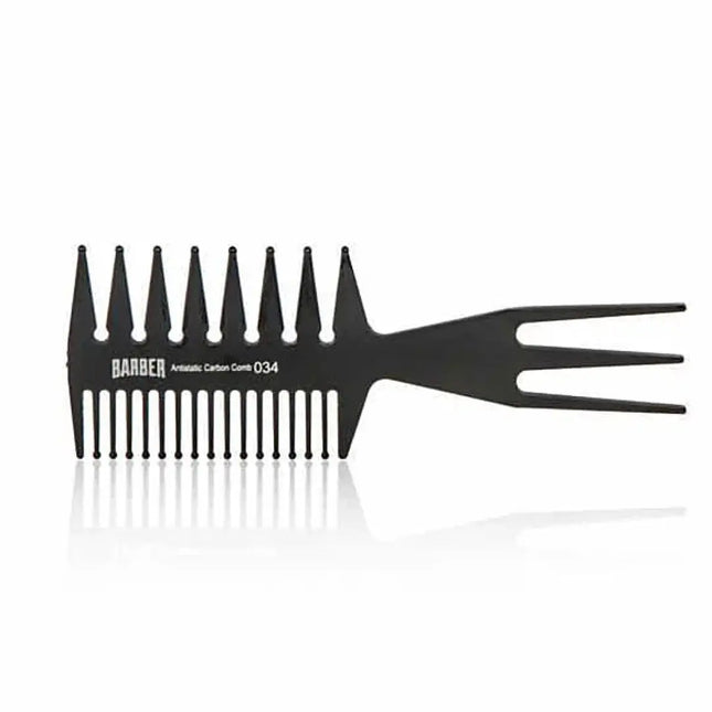 “Marmara BARBER Wide Tooth Comb Nº 034 held by a barber, showing its sturdy build”
