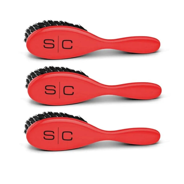 Three red hairbrushes with black bristles, arranged vertically on a white background. Each brush has a black 'S|C' logo on the handle.