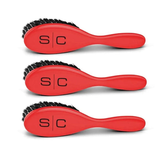 Three red hairbrushes with black bristles, arranged vertically on a white background. Each brush has a black 'S|C' logo on the handle.