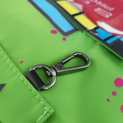 StyleCraft Radioactive Apron Close-up of a green bag with a metal carabiner on a colorful background