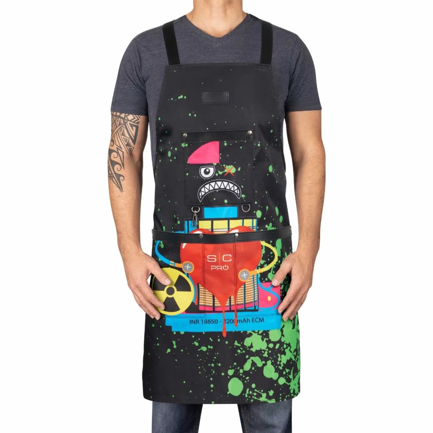 StyleCraft Radioactive Apron Person wearing a colorful apron with cartoon character design on a white background