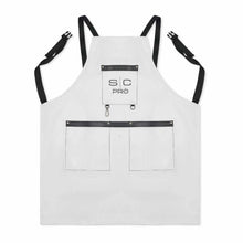 StyleCraft Pro Apron White apron with black straps and pockets on a white background