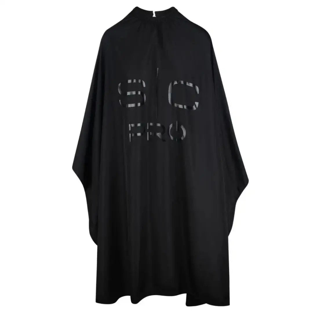 Black barber cape with 'BOC' branding on a white background
