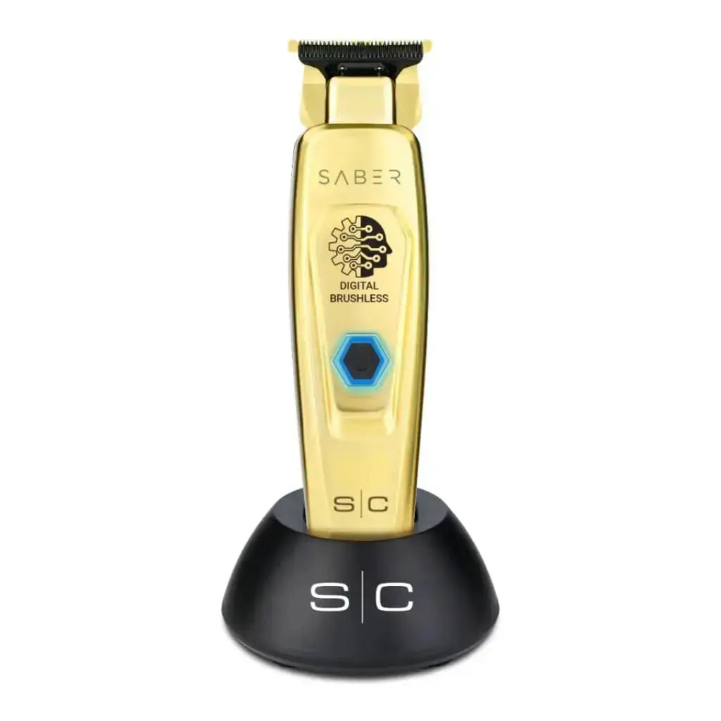 Saber Gold hair trimmer with black stand on a white background