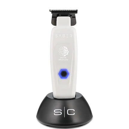 Saber grooming tool with black and white design on a white background