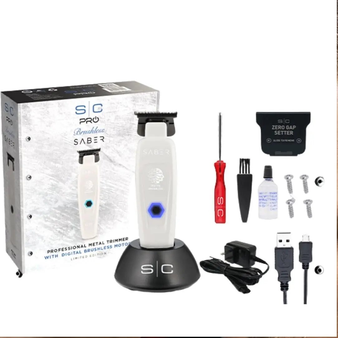 Professional grooming kit with trimmer, accessories, and packaging on a white background