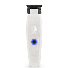 White hair trimmer with black top on a white background