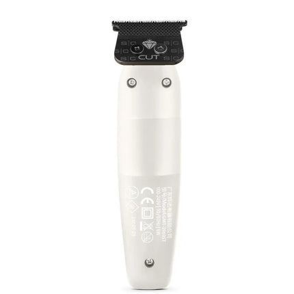 Hair trimmer with black top and white handle on a white background