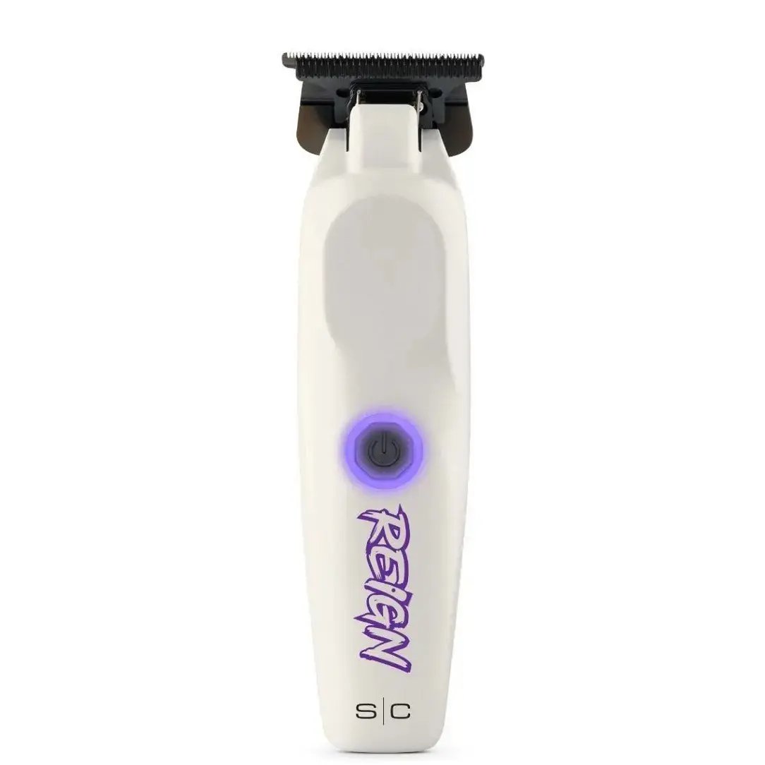 White grooming tool with purple accents and 'Reign' branding on a white background