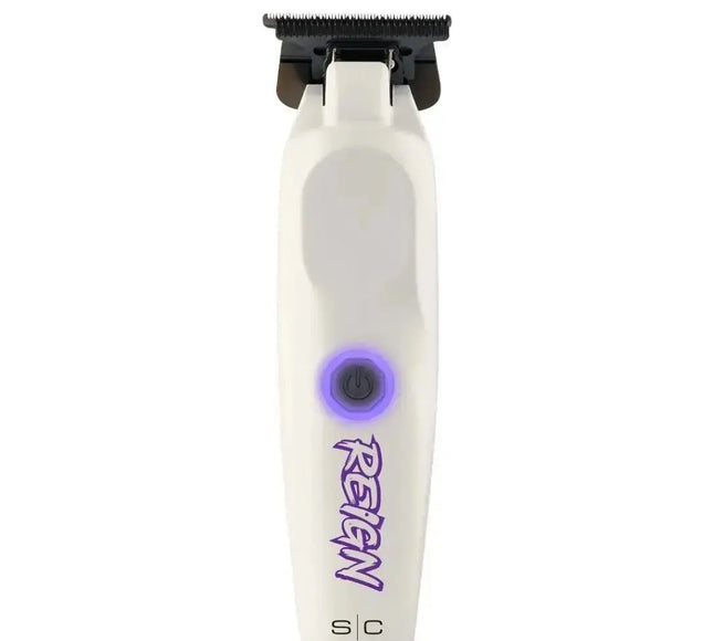 White grooming tool with purple accents and 'Reign' branding on a white background