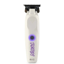 White grooming tool with purple accents and 'Reign' branding on a white background