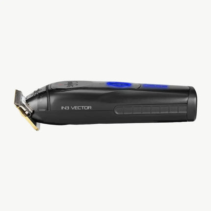 Black IN3 VECTOR electric trimmer with blue buttons and a gold-colored metal blade, shown against a plain light gray background.
