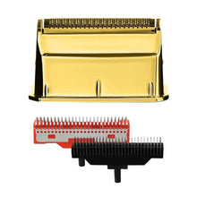 Gold and black hair trimmer head with red comb on a white background