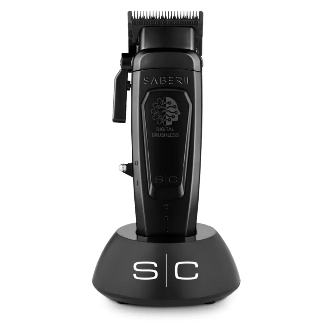 Saber II professional cordless hair clipper with a black body, placed on a charging stand, with the branding visible on the side.