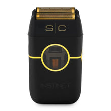 Black and gold electric shaver with 'SC' branding on a white background
