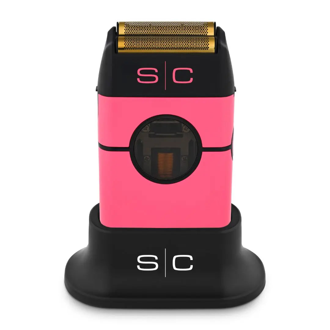 A pink Instinct Metal Shaver with a double foil design, branded with the letters 'S/C' on the side, displayed on a black background.