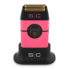 A pink Instinct Metal Shaver with a double foil design, branded with the letters 'S/C' on the side, displayed on a black background.
