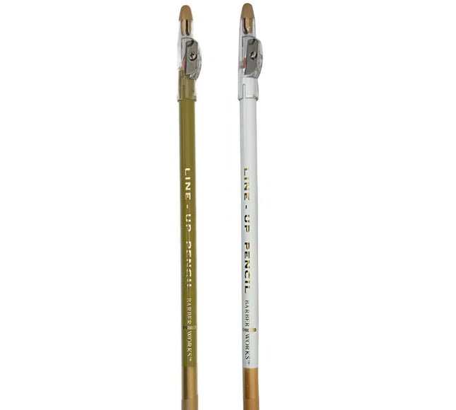 Barber Works  line-up pencil, one gold and one white, on a white background