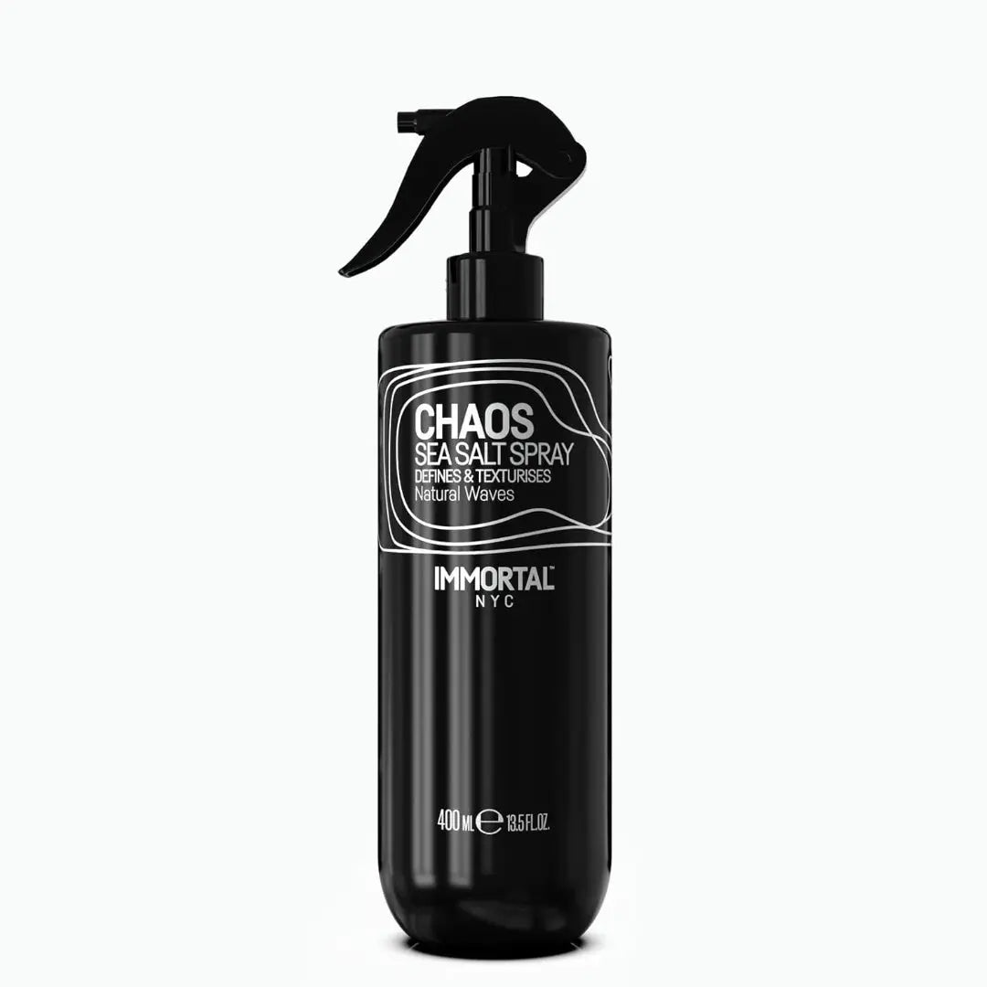 Black spray bottle labeled 'Chaos Sea Salt Spray' by Immortal NYC on a white background