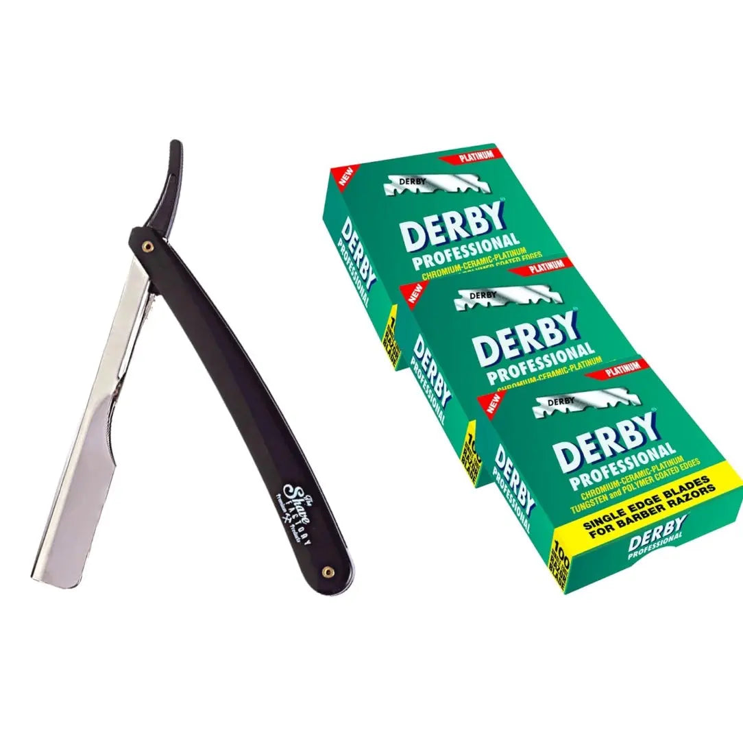 Shaving razor with black handle and silver blade next to a green box of Derby razor blades on a white background