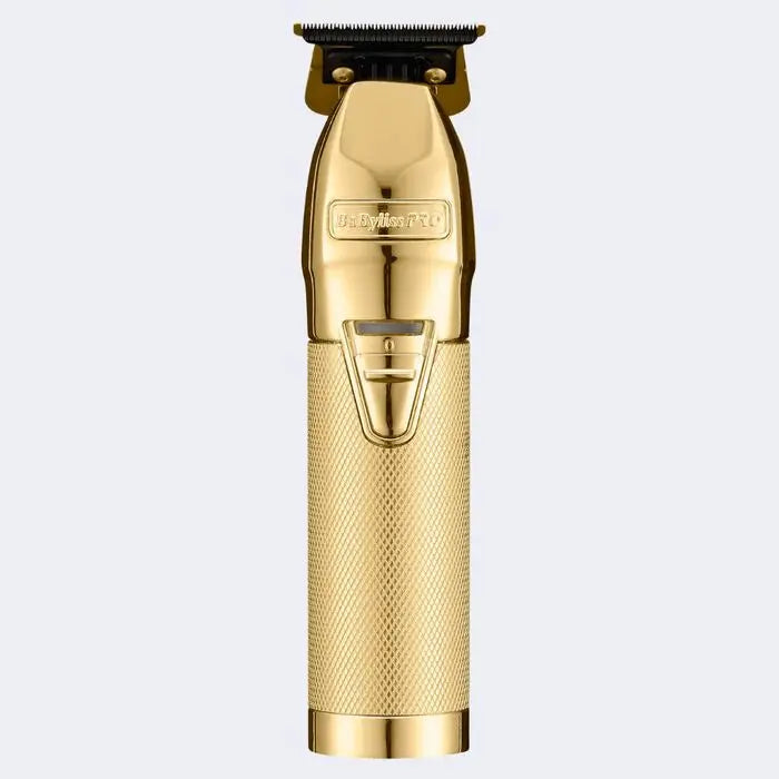 BabylissPro Gold hair clipper on a light gray background