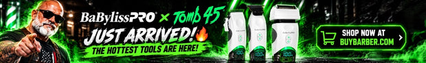 Promotional banner for BaBylissPRO and Tomb 45 hair tools, showing three white and black hair styler bottles with green mist effects, a man pointing, and text reading 'Just Arrived' and 'Shop Now at Buybarber.com'.