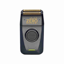A professional finishing shaver with gold titanium premium foils, a black body with green accents, and a precision trimmer.