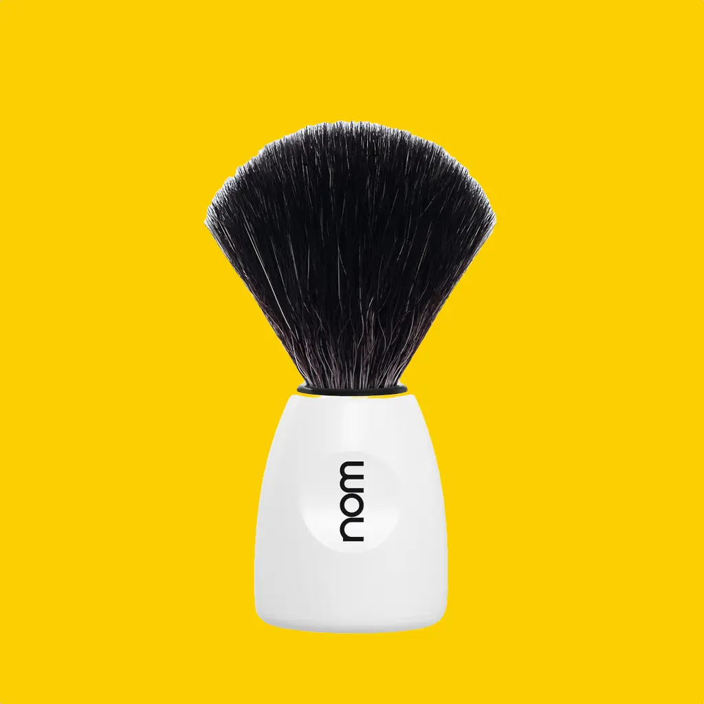 NOM Shaving Brush, Black Fibre, Plastic White - BUYBARBER.COM